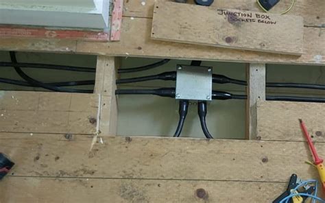 shielded wire into junction box|running armored cable into plastic box.